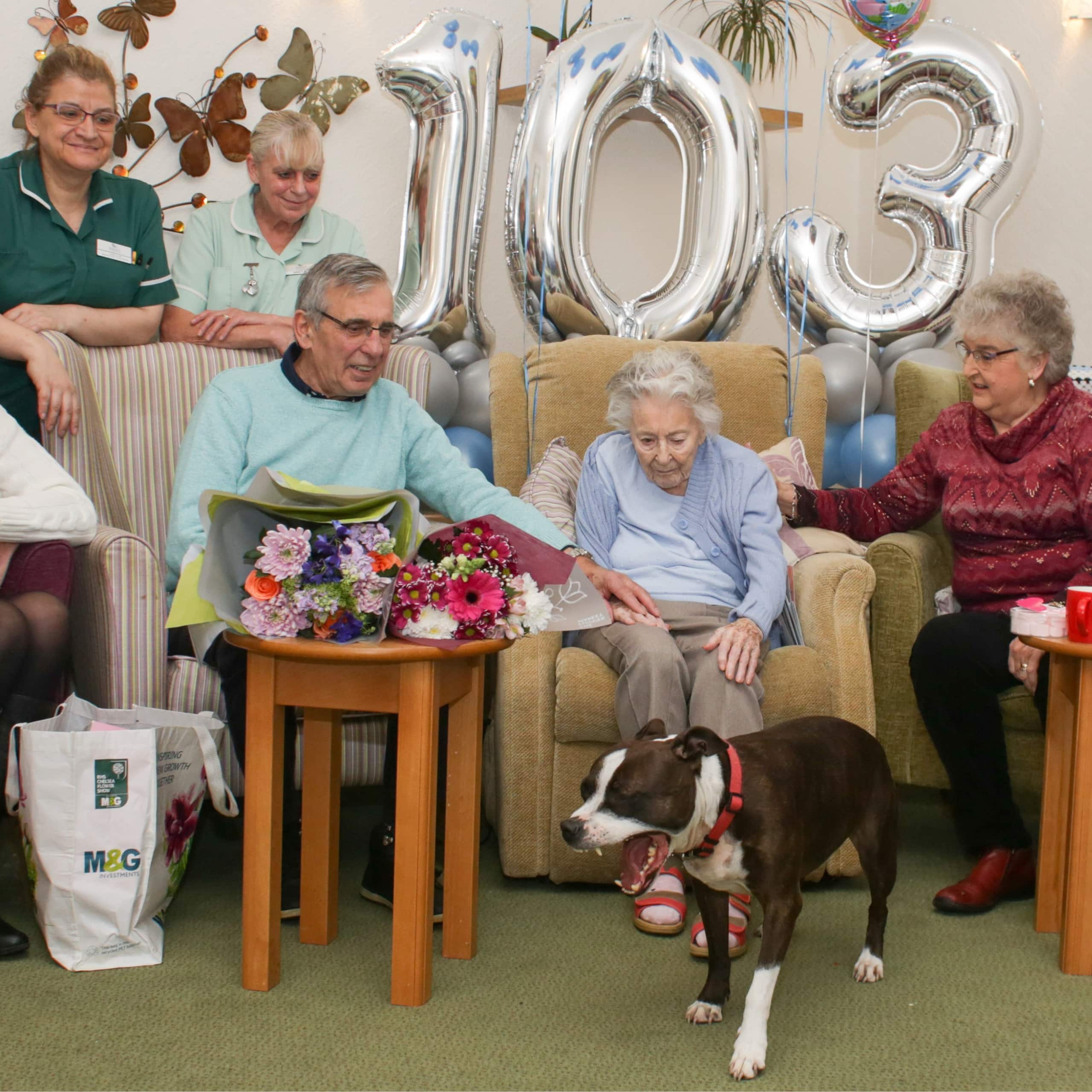Westerham Place Care Home resident Mickie surrounded by friends and family celebrating her birthday.