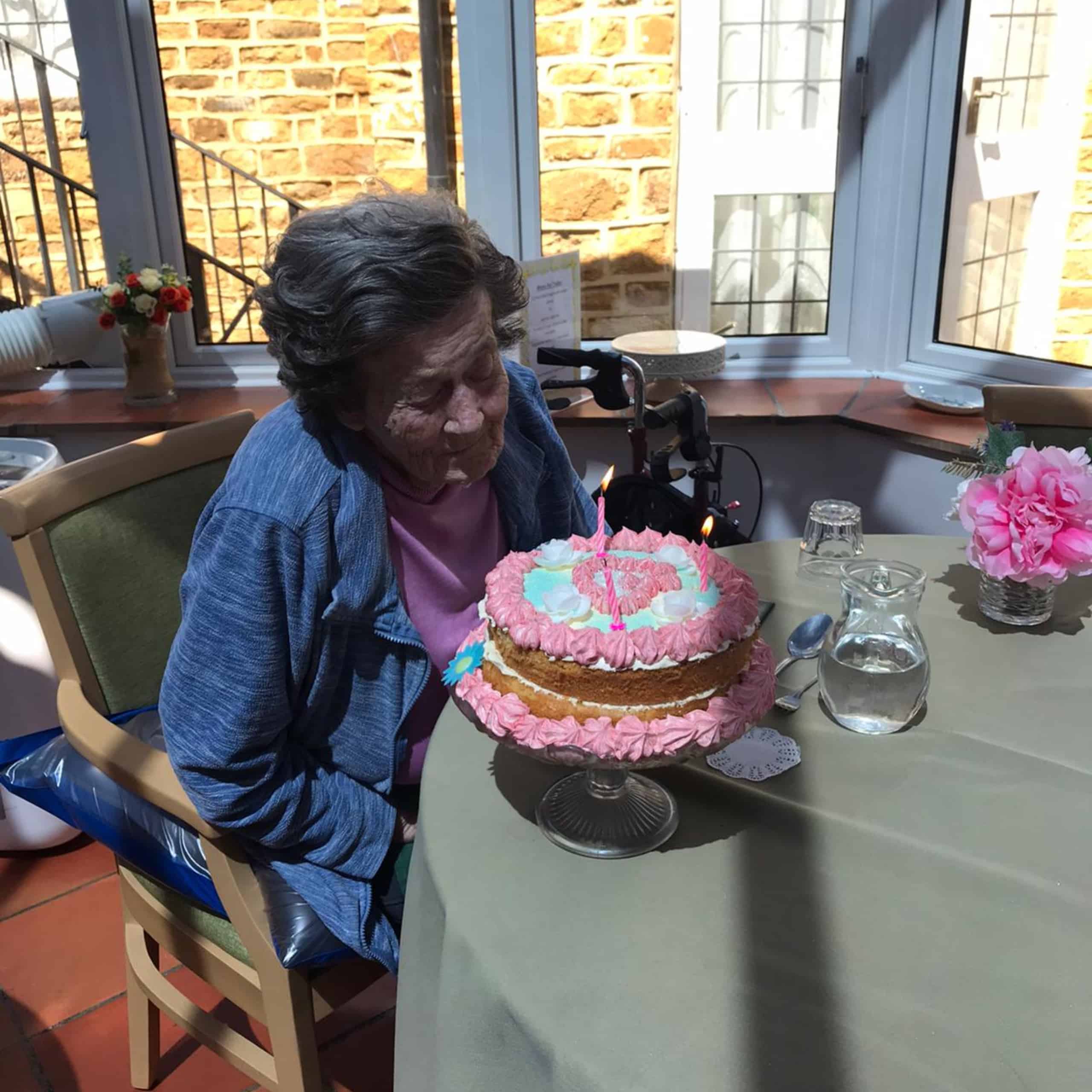 Featherton House Care Home resident Pamela with her home made birthday cake.