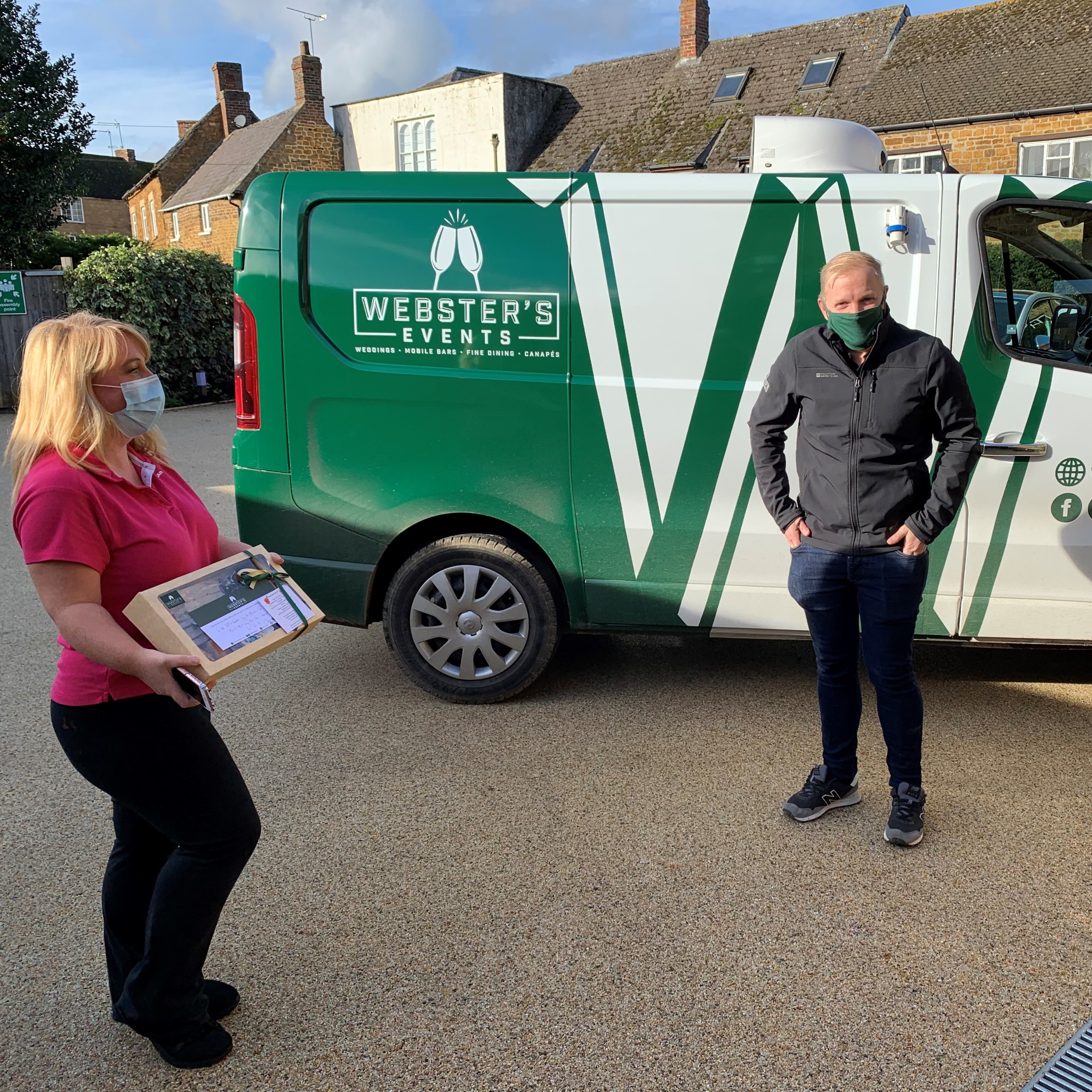 Featherton House Care Home activities coordinator Gemma taking delivery of individually-wrapped afternoon teas from Webster's Event Catering.