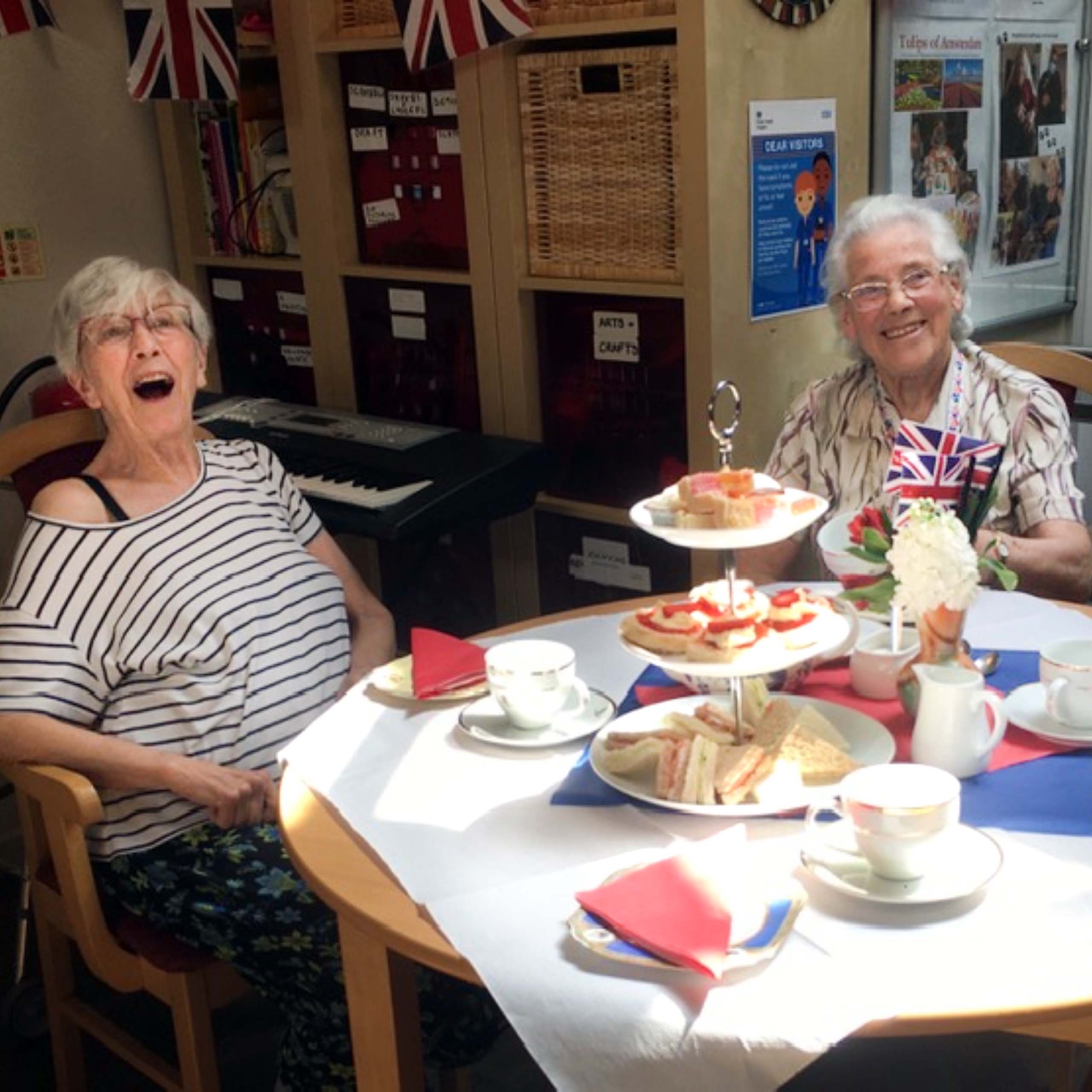 Linden House Care Home residents enjoying their 1940s themed afternoon tea.