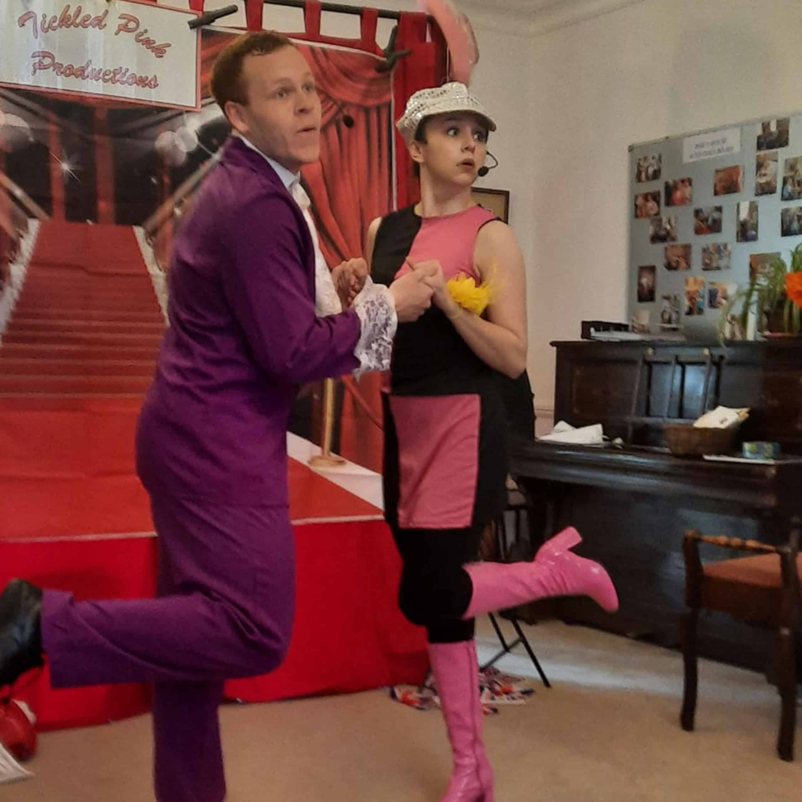Tickled Pink Productions perform their Back to the Sixties show for the residents of Wren House in the home's lounge.